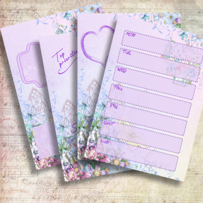 four sheets of purple planner stickers