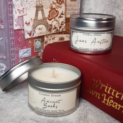 Soy wax candles photographed around books