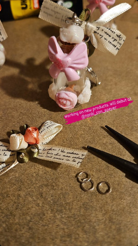 instagram story. ribbon with flowers, keyring with roses and pliers.